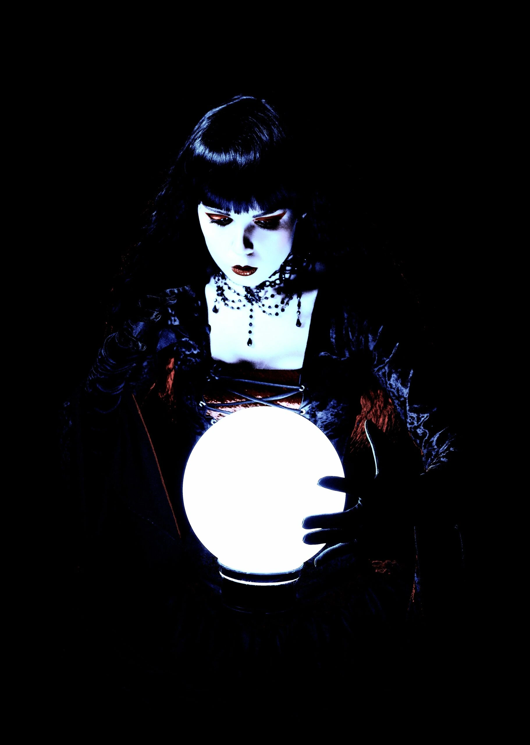witch with her crystal ball