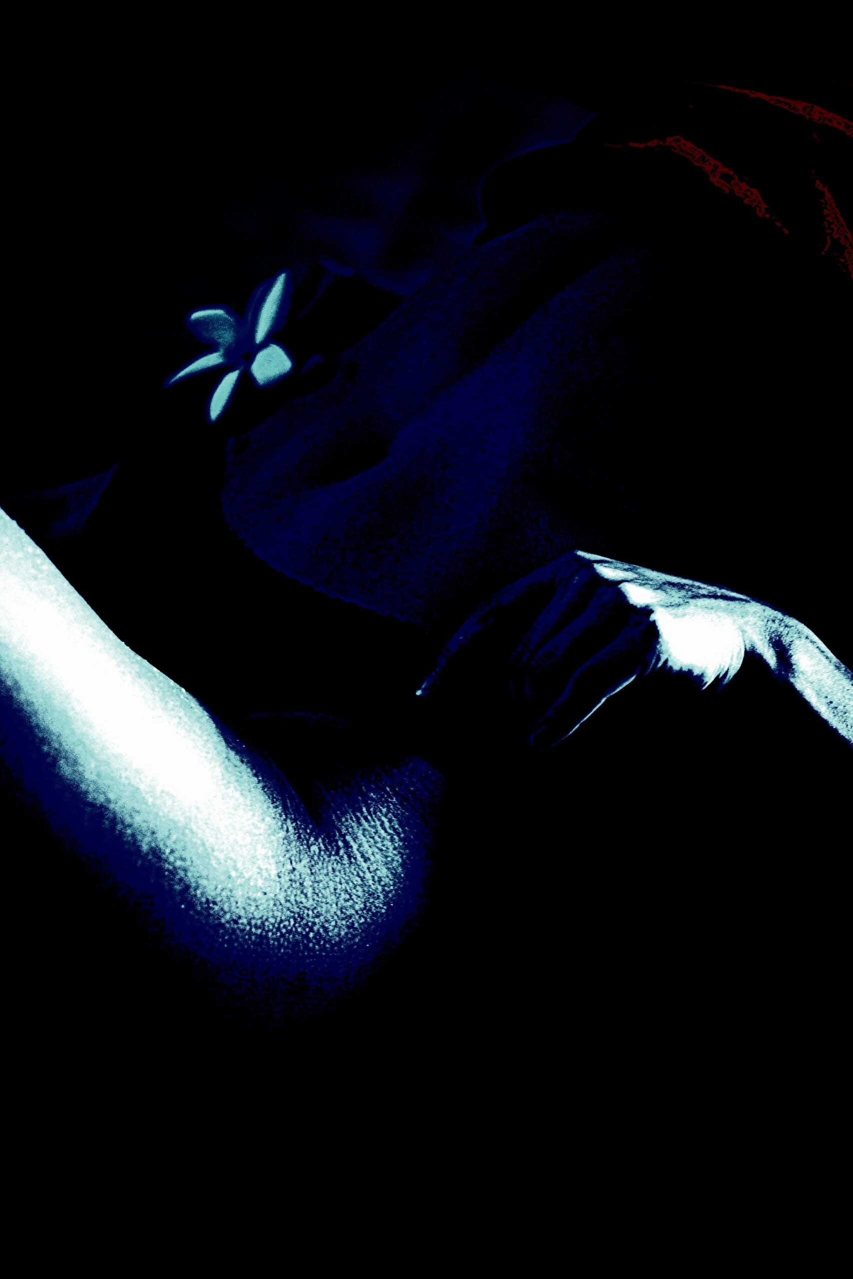 A close-up of a gothic style with lace and skin, depicting the sensual and confident side of goth fashion.