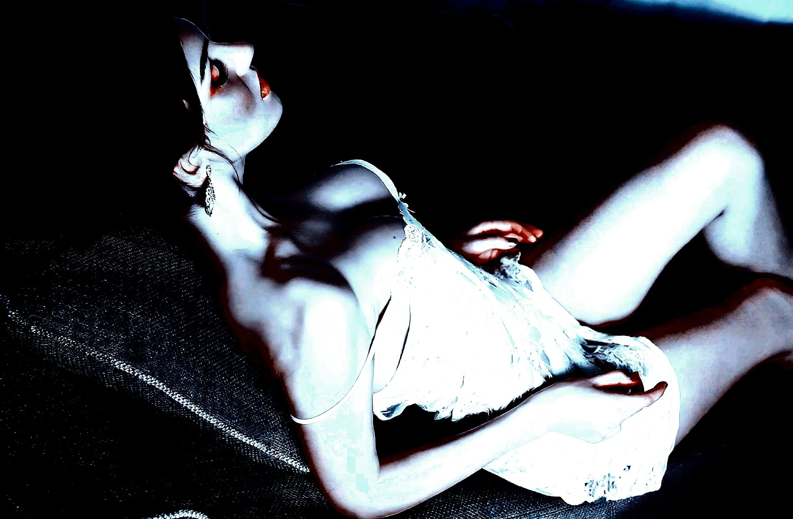 Ethereal portrayal of gender fluidity with a person in a delicate, reclined position.
