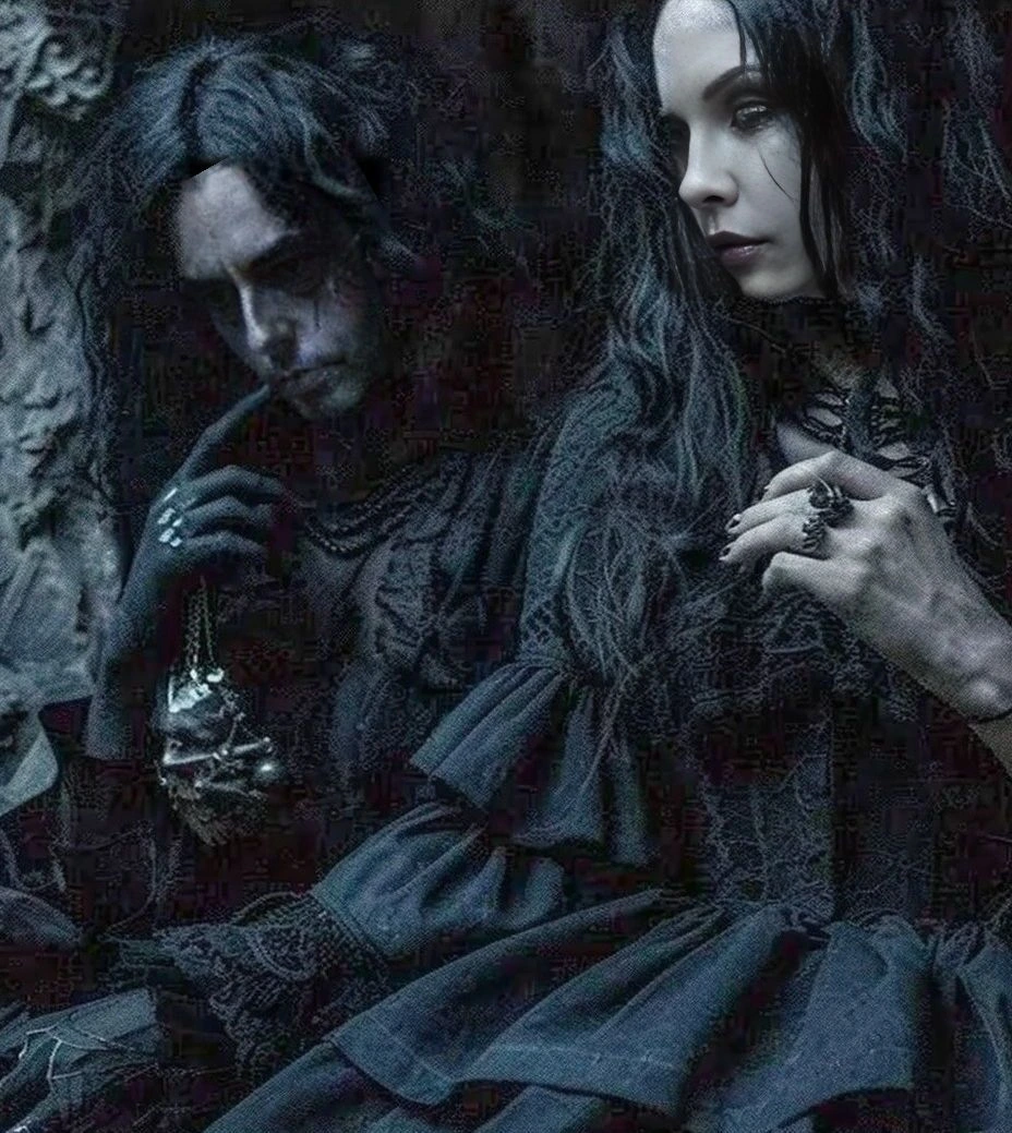 Gothic couple in a decayed, gothic room with a haunting atmosphere.