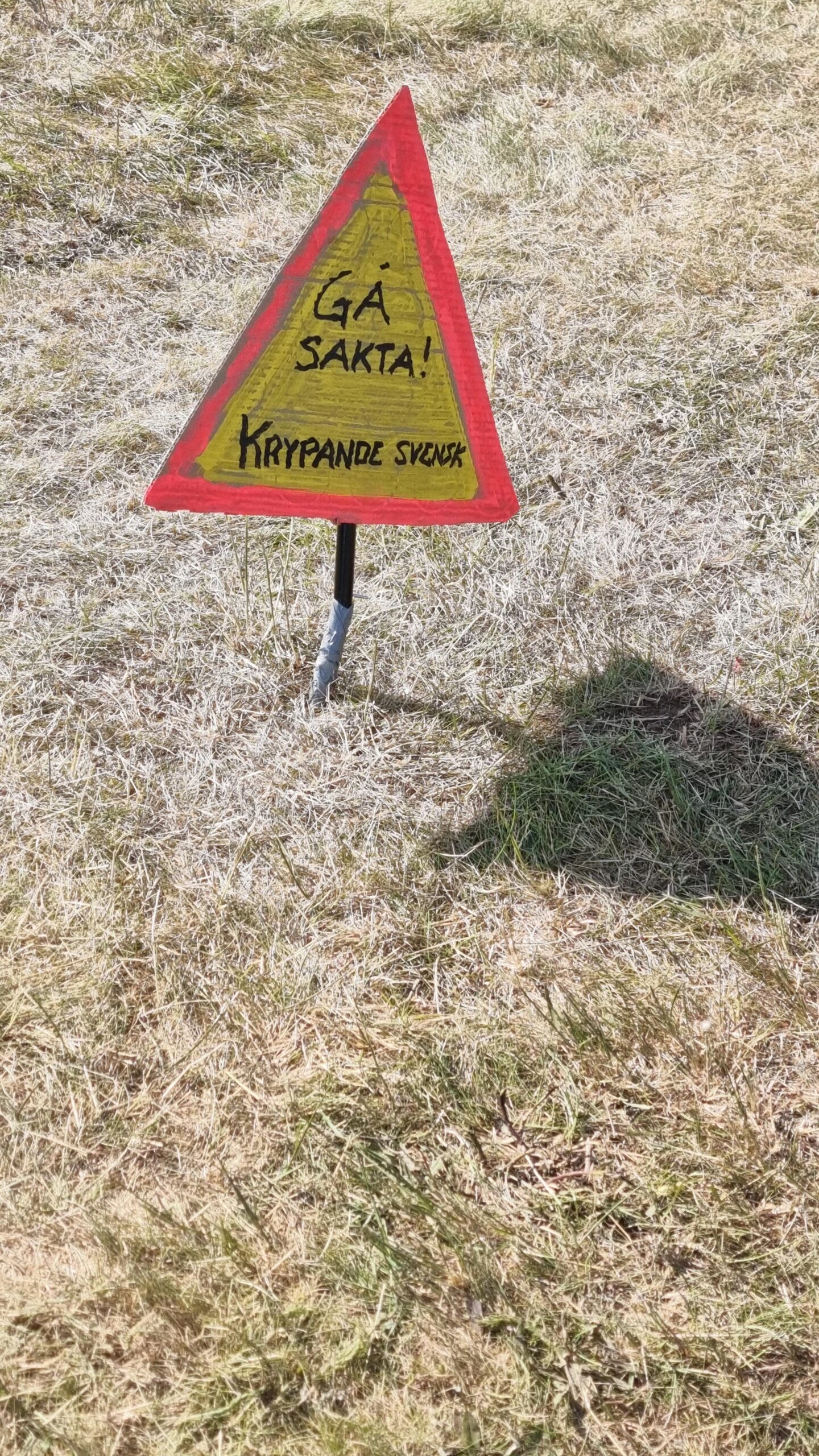 Hand-painted sign at the campsite of Sweden Rock Festival 2024