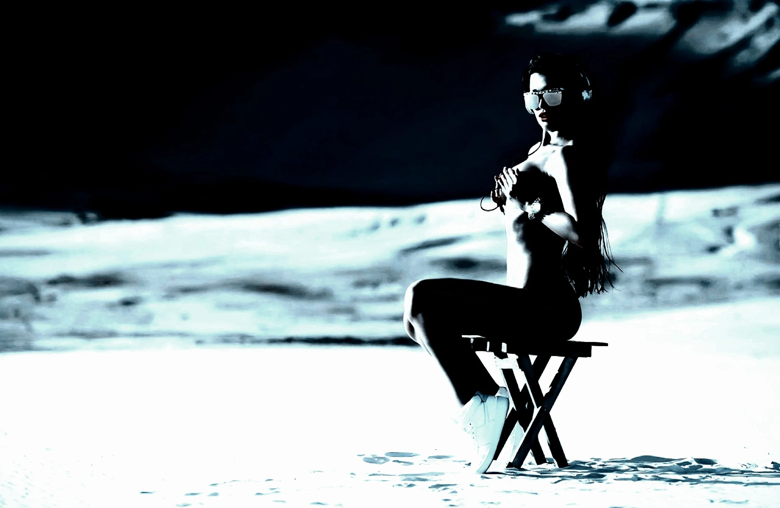 Woman in an alluring pose, representing the dark elegance of BDSM practices.
