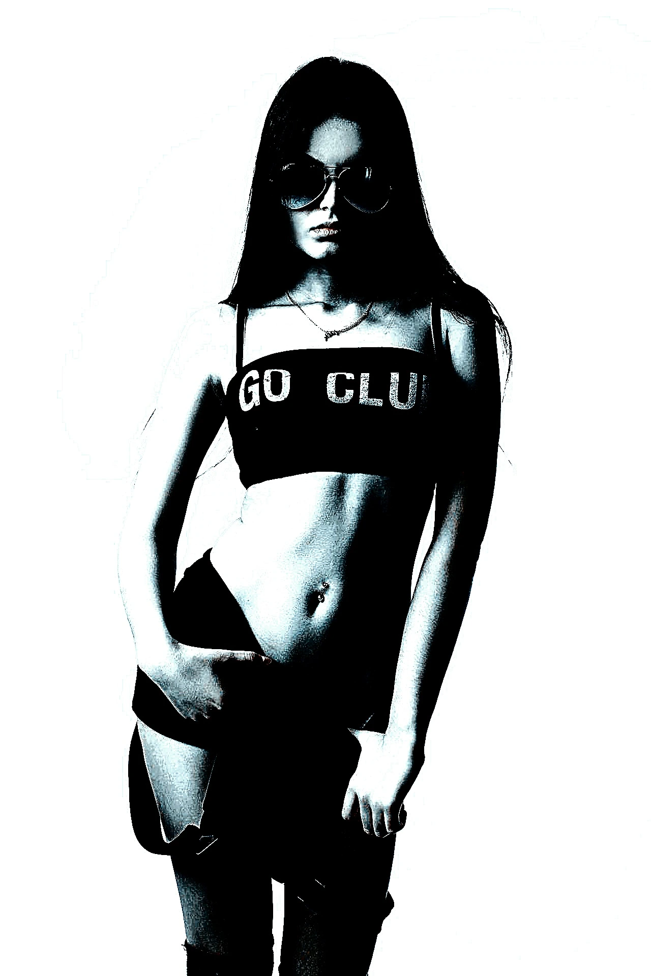 Woman wearing a crop top and overalls, with sunglasses and long hair.