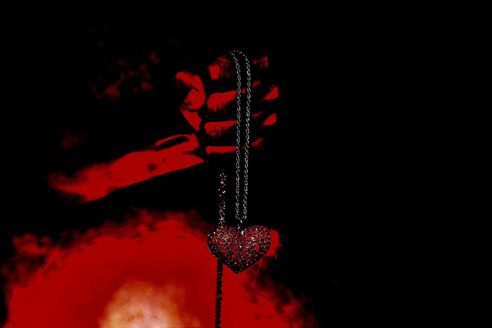 Hand holding a dark heart-shaped pendant in a blood-red, ominous light, symbolizing gothic romance and mystery. 
