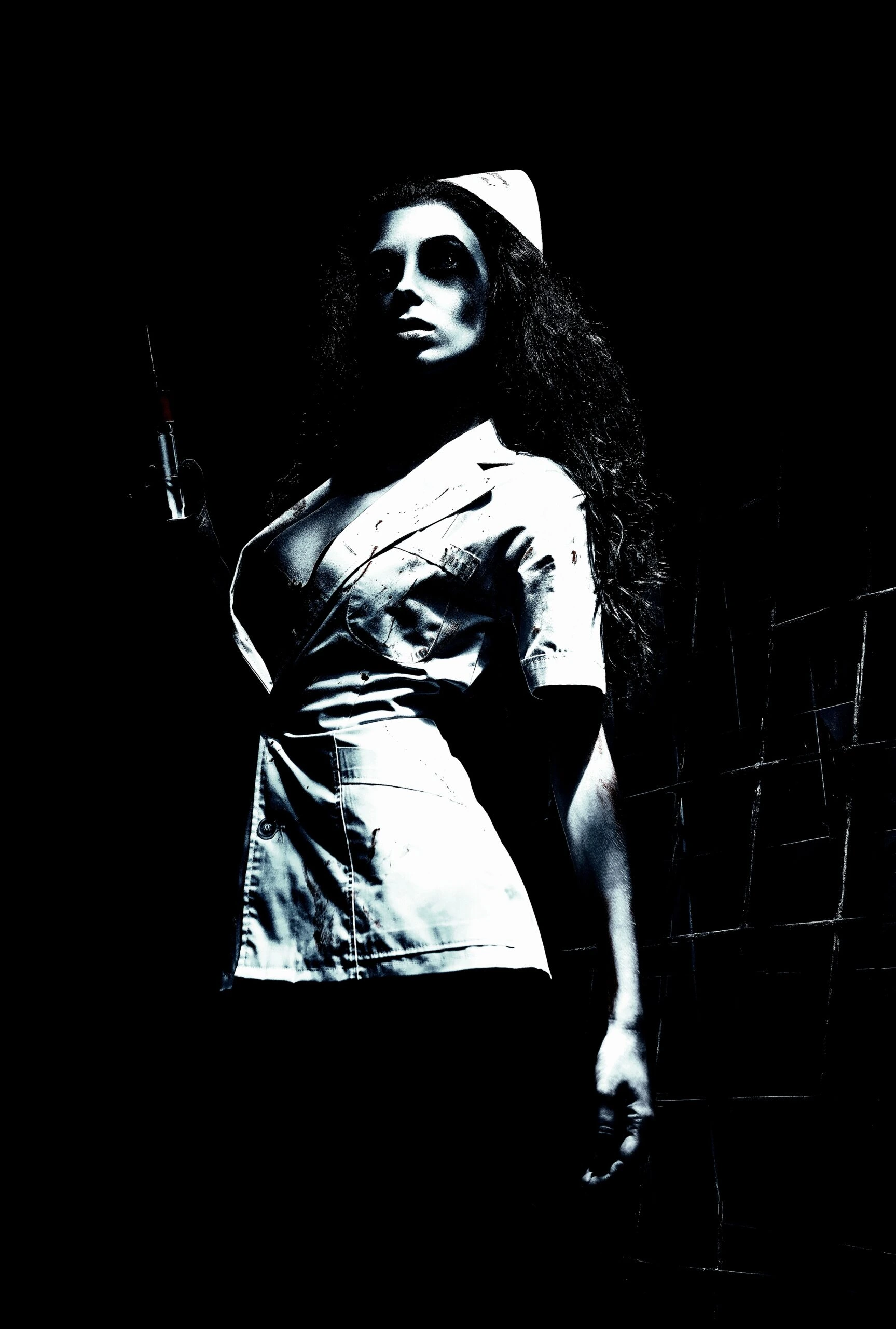 A shadowy figure of a woman partially obscured by a doorway, wearing a t-shirt, her features bathed in darkness, evoking a sense of mystery. 