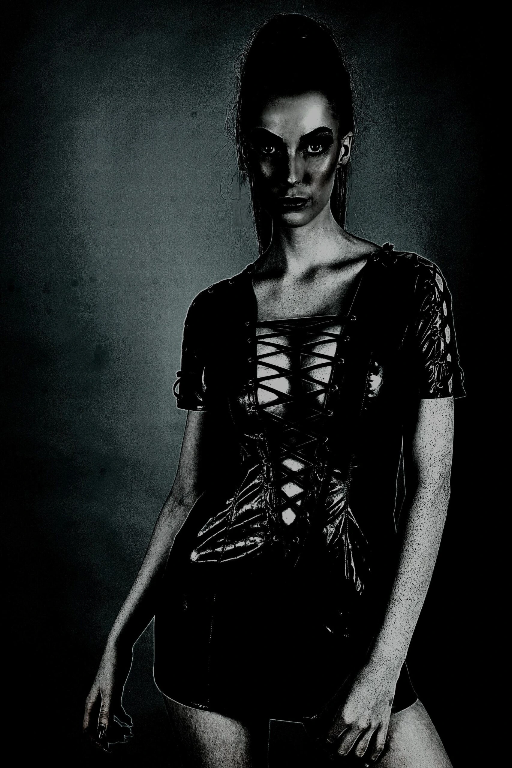 A woman in a black lace-up corset dress, showcasing a gothic aesthetic with an edgy, rebellious vibe.