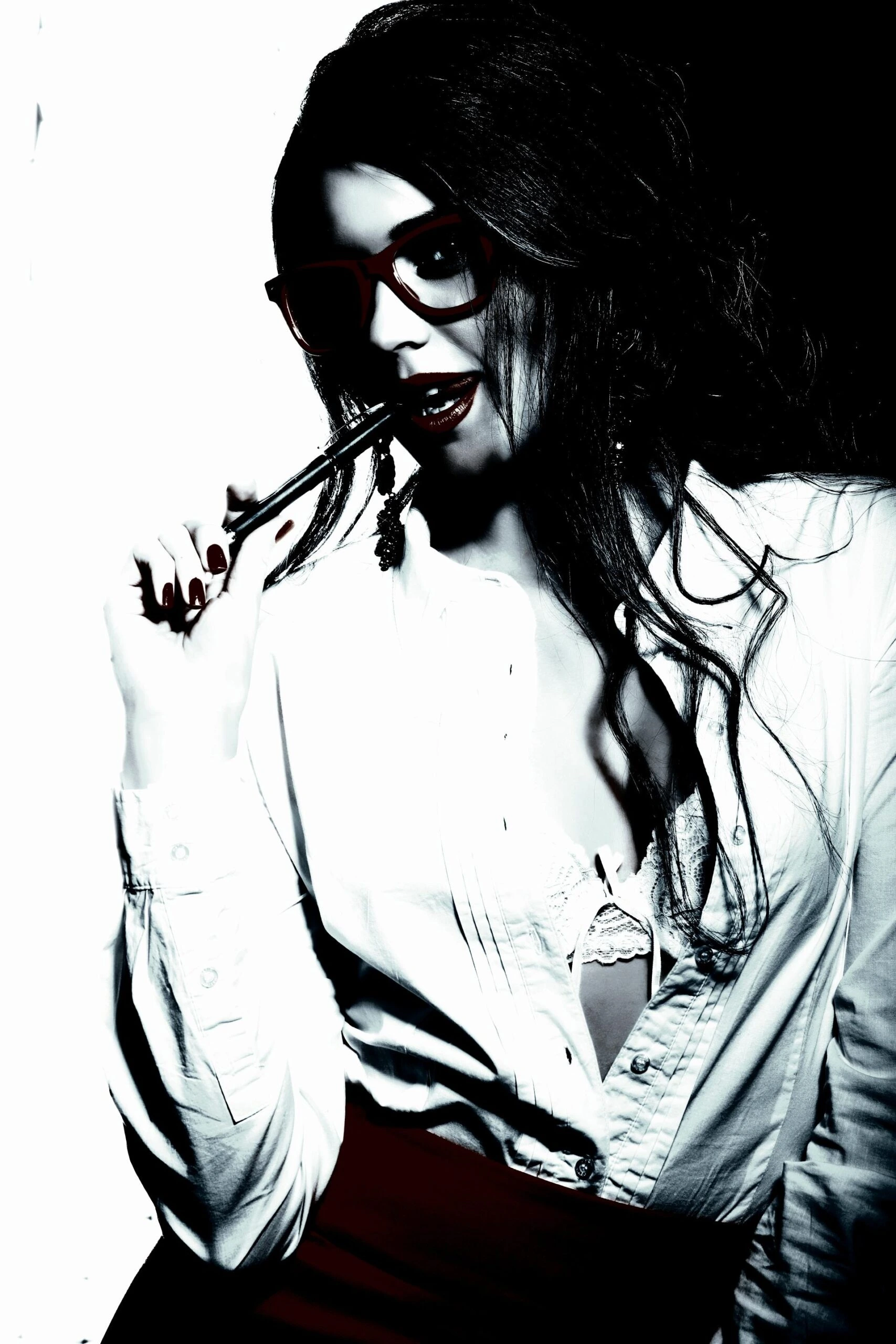 Fashionable woman in a classic shirt and bold accessories, blending sophistication and allure.