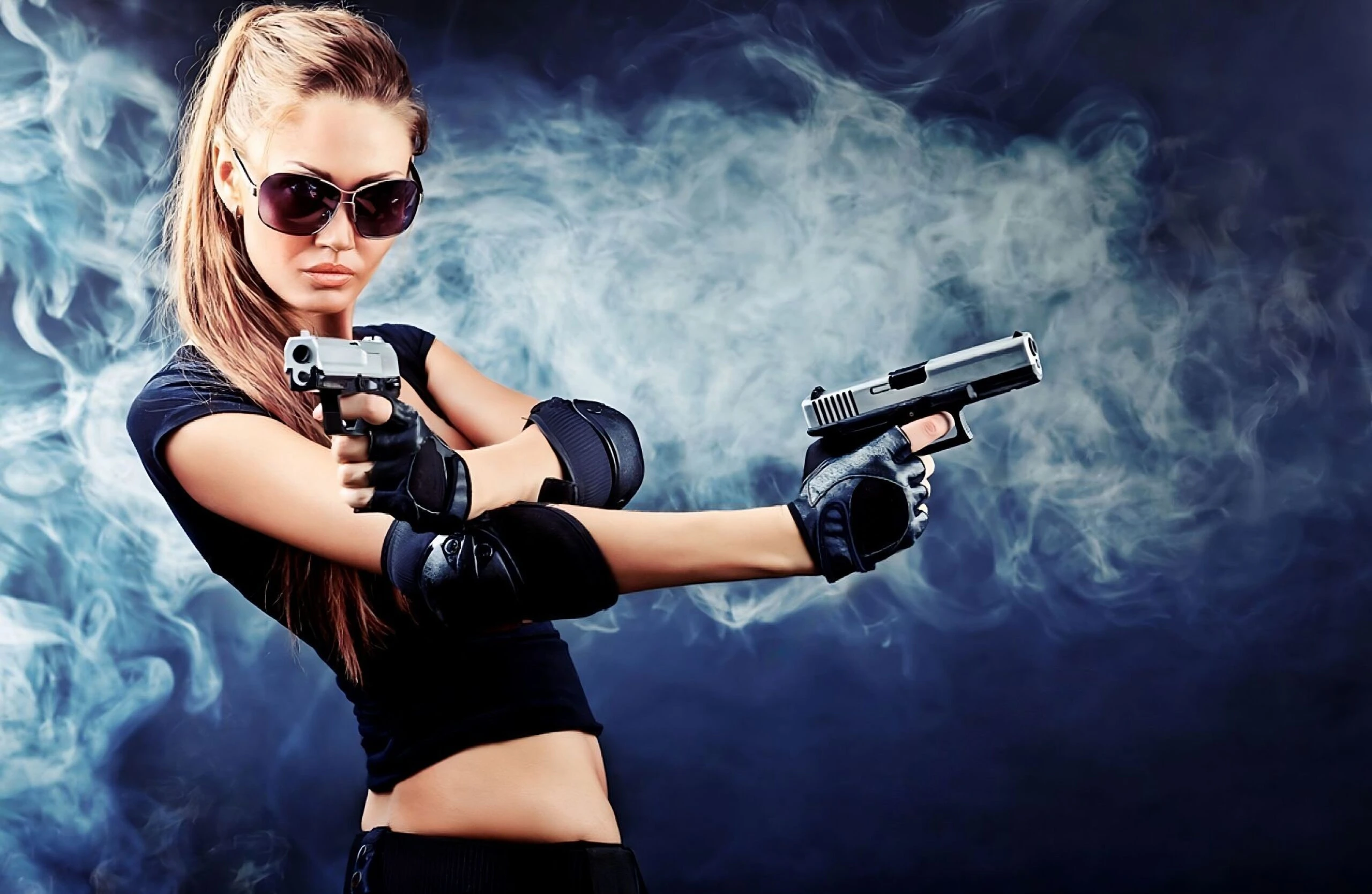 A confident woman in black tactical gear, sunglasses, and gloves, holding two pistols in a dramatic, smoky setting.