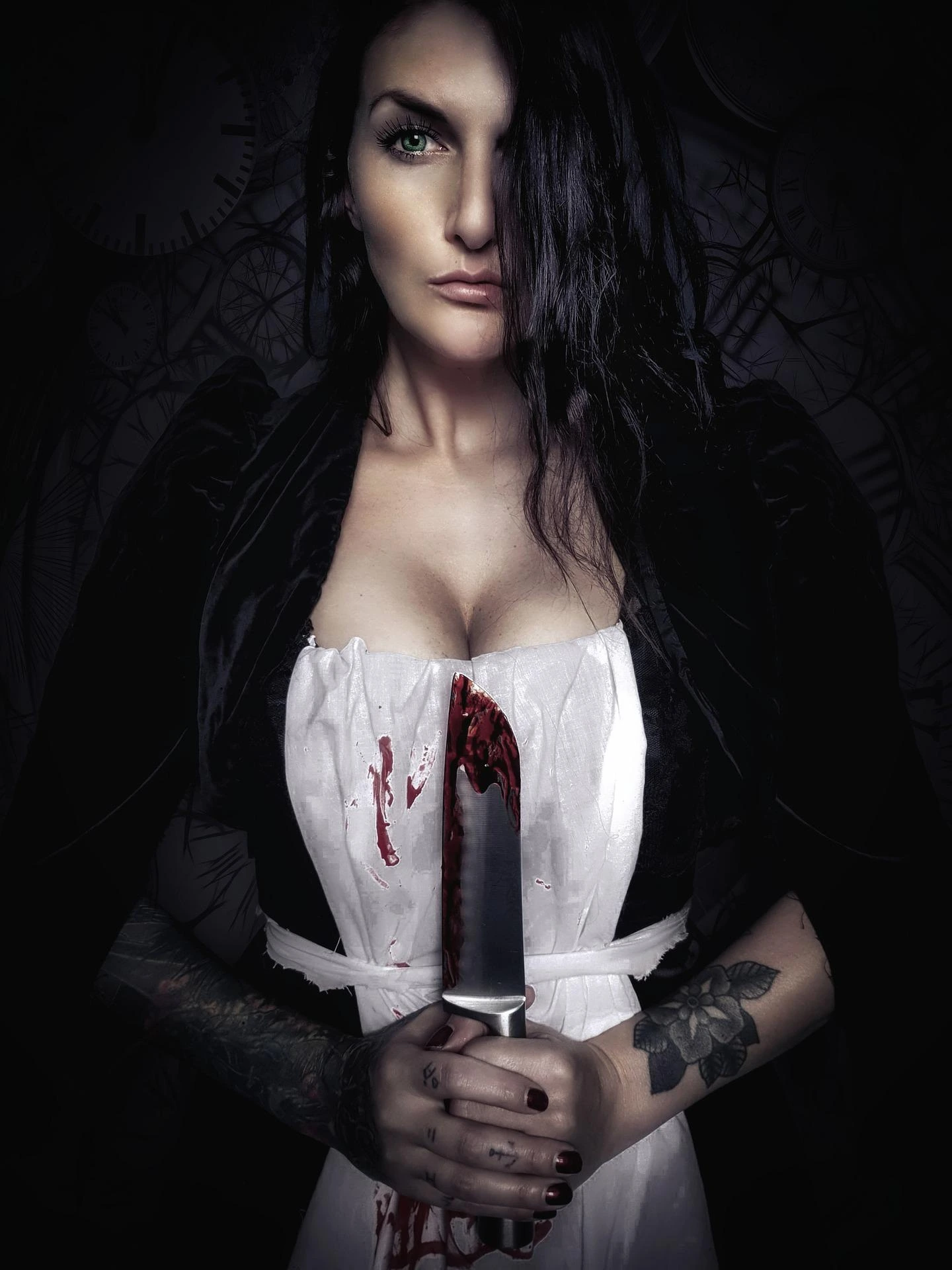 Tattooed gothic woman in blood-stained apron holding a bloody knife with intense stare