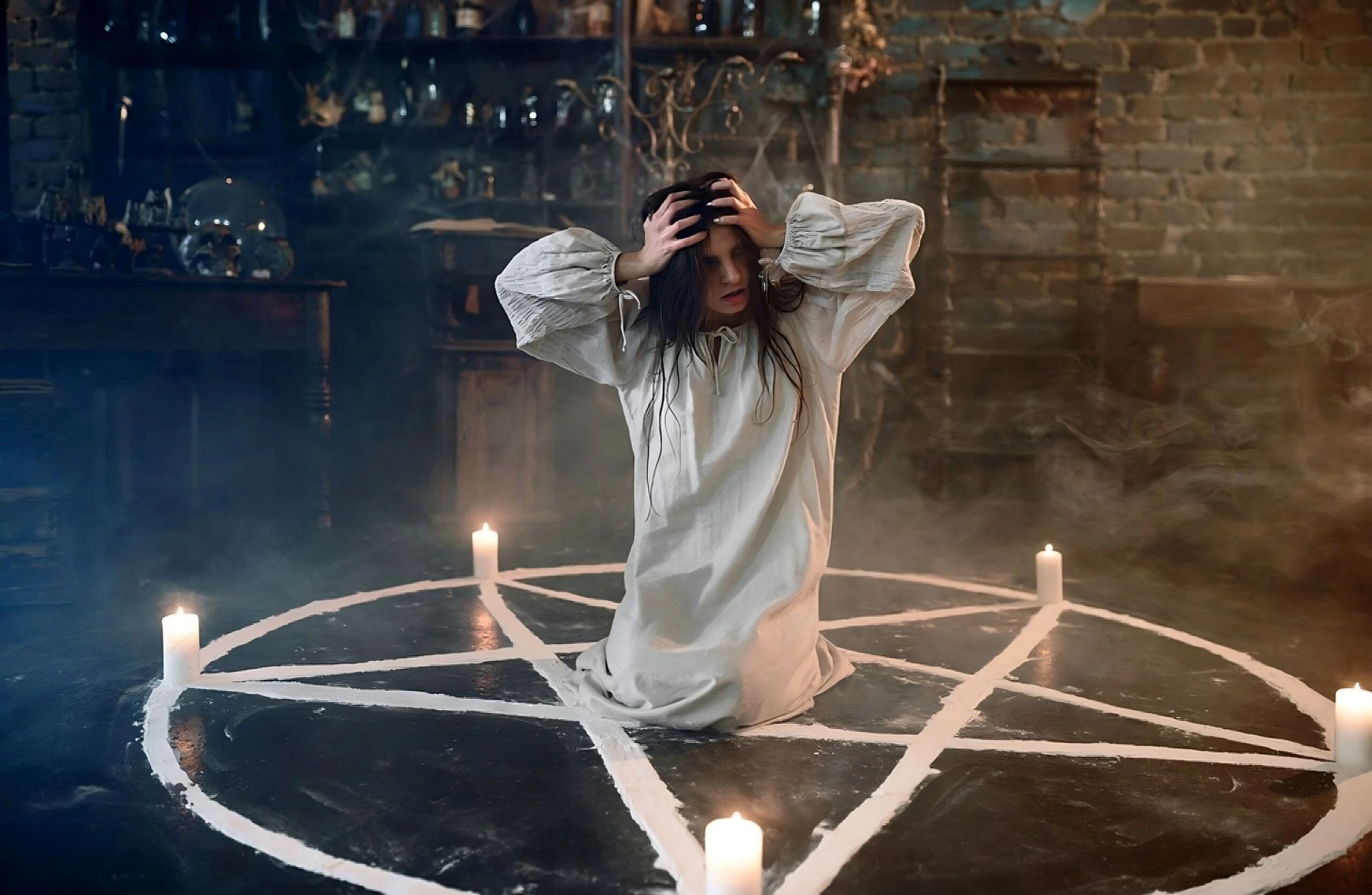 Gothic demoness with horns and wings, wearing dark armor, standing powerfully in a dungeon-like setting.