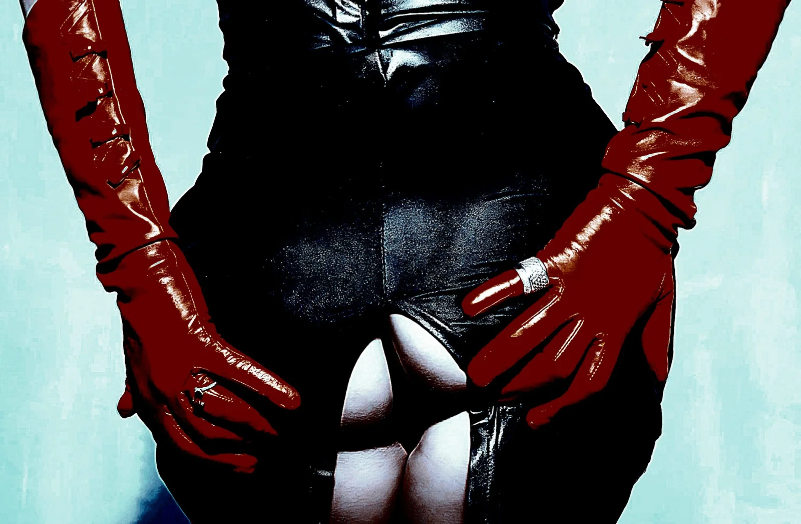 Close-up of waist and hips in tight black leather skirt, red gloves pulling fabric open.